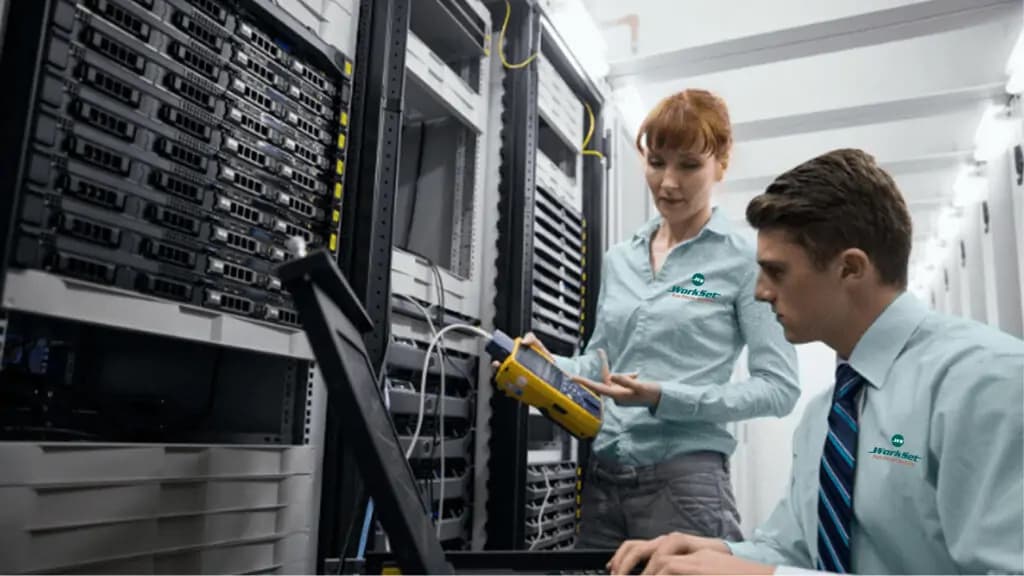 Network engineer working on rack